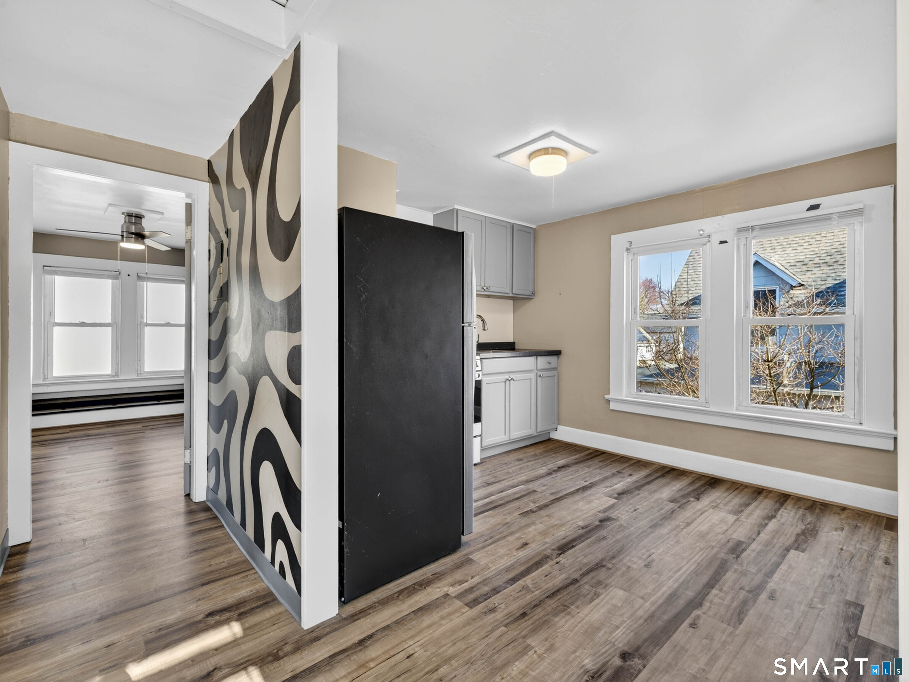 97 Woodland Street Meriden, CT 06451 - Photo 21 of 35 a view of entryway with wooden floor and window