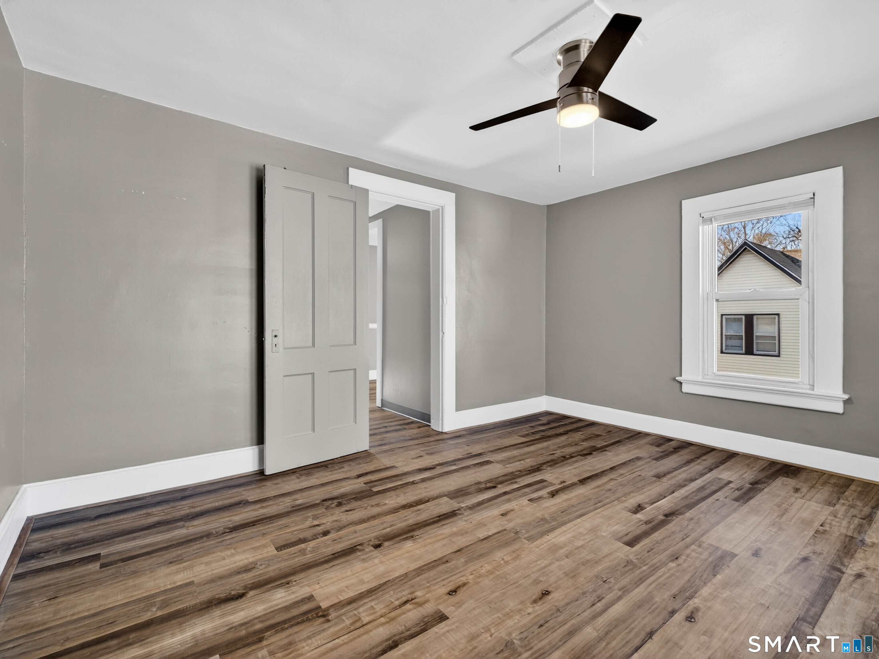97 Woodland Street Meriden, CT 06451 - Photo 24 of 35 a view of empty room with wooden floor