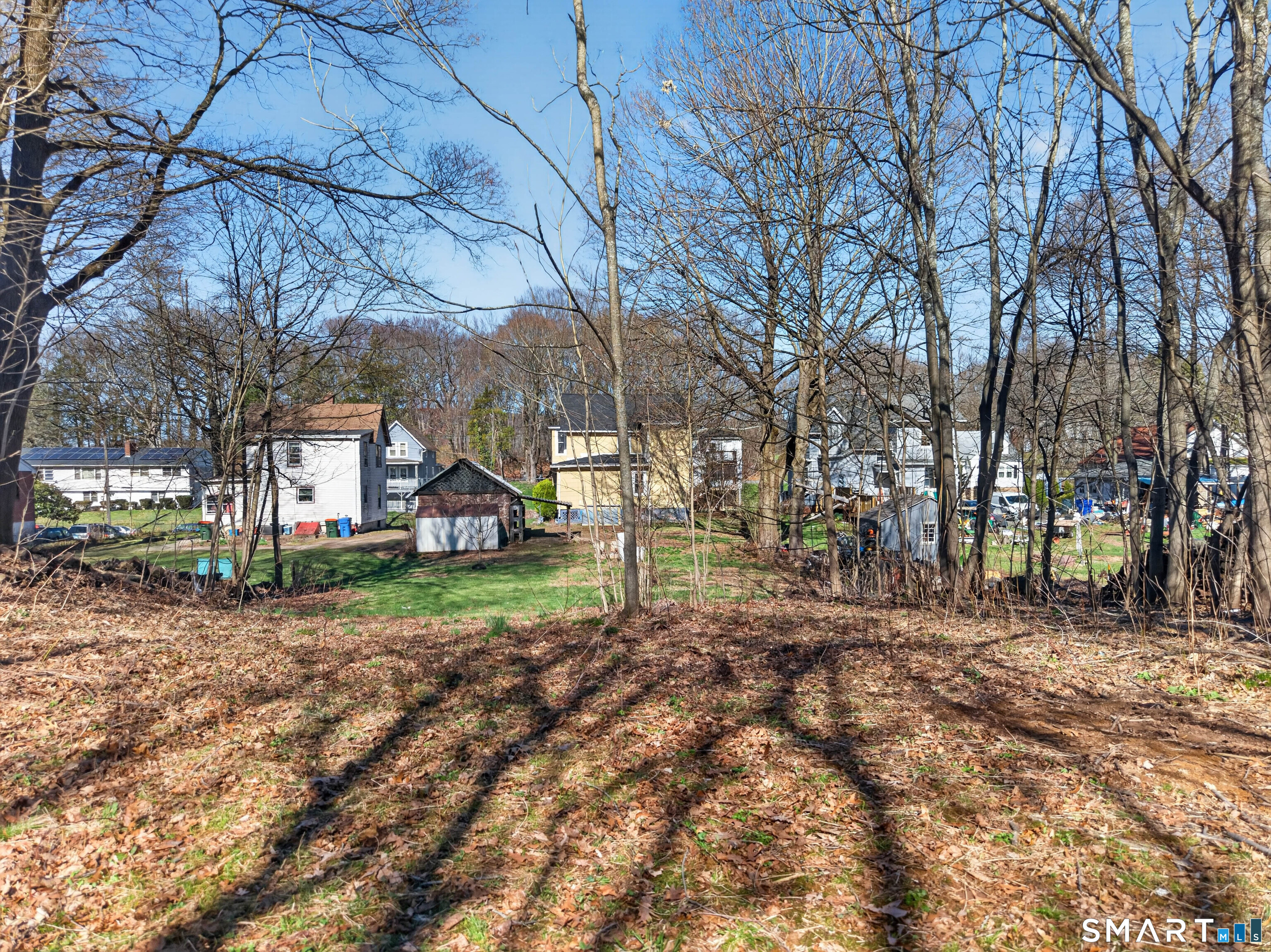 97 Woodland Street Meriden, CT 06451 - Photo 27 of 35 a view of road with trees