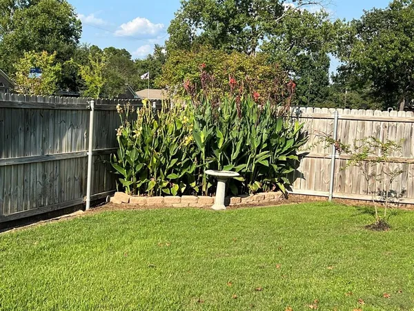 a view of a backyard with a garden