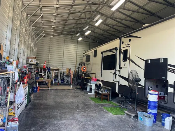 a view of a storage room with furniture