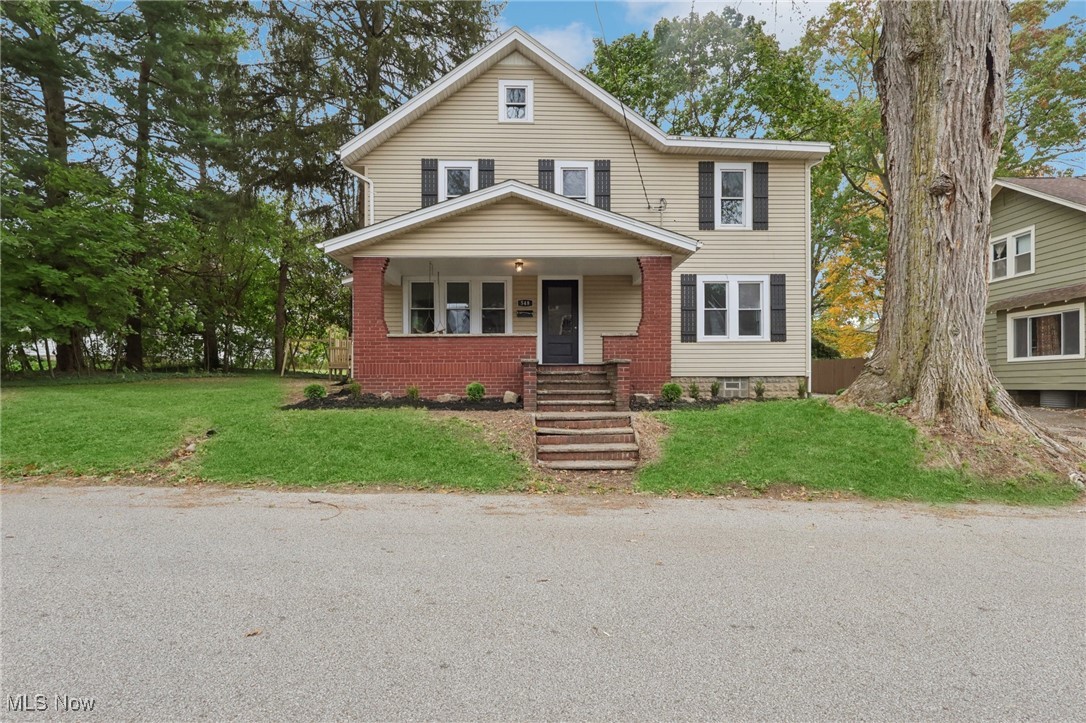 548 Spring Street Wooster, OH 44691 - Photo 42 of 45 View of front of property featuring covered porch and a front yard