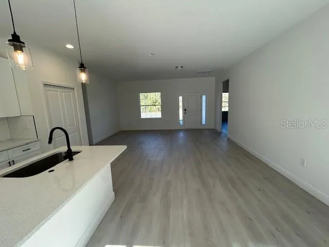 a view of a sink and a mirror
