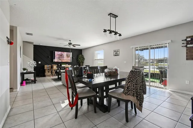 a view of a hallway to closet and a mirror
