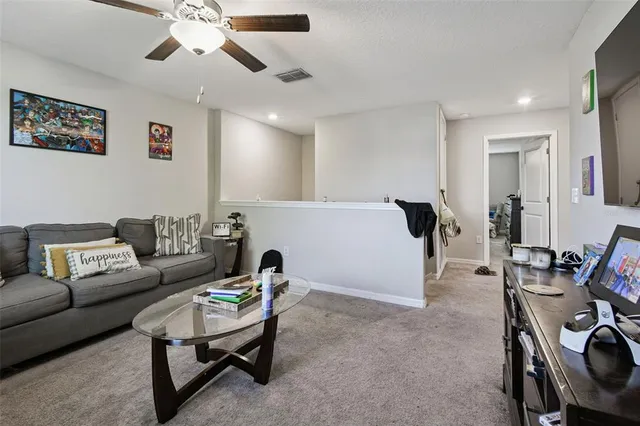 a bedroom with bed and window