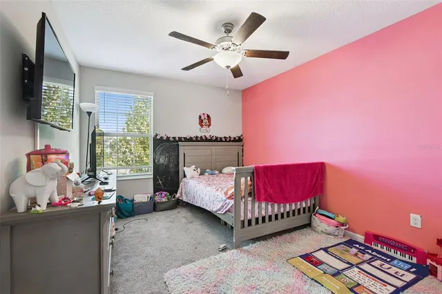 a house with tree in front of it