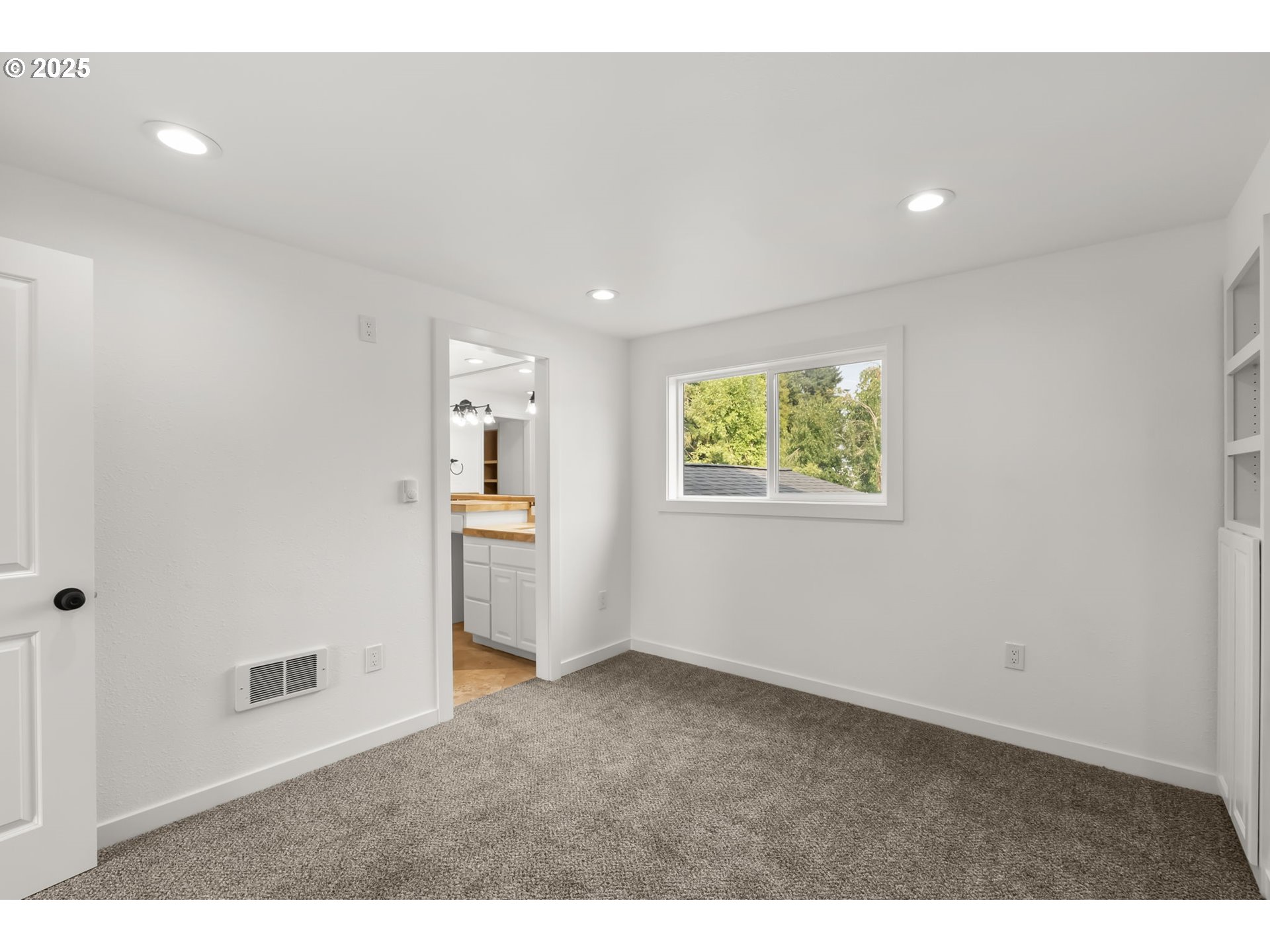 487 72nd Street Springfield, OR 97478 - Photo 8 of 23 a view of an empty room with a window