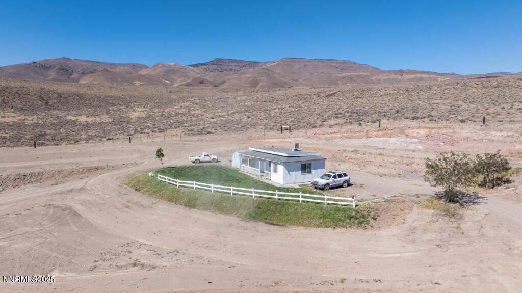 97567 State Route 34 Gerlach, NV 89412 - Photo 31 of 31 a view of a house with a yard and a lake view