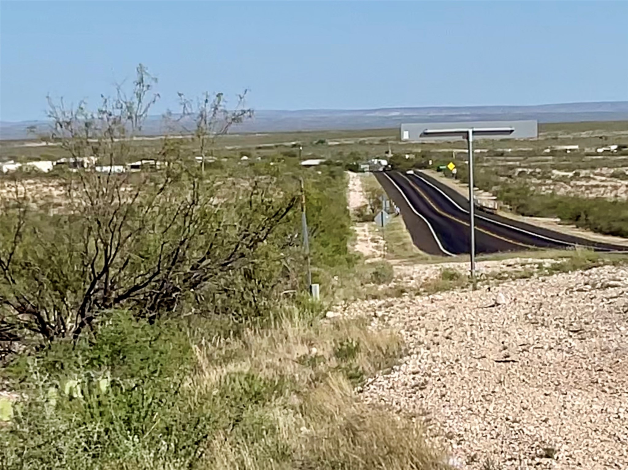 O Shafter Crossing Road Dryden, TX 78851 - Photo 1 of 7 Short drive into town of Dryden. Follow Hwy 90, 20 minutes west to city of Sanderson, population 2,300, located in the foothills of mountain range in distant view.