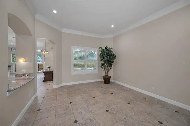 a spacious bathroom with a bathtub and window