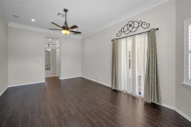 a view of a swimming pool with a yard