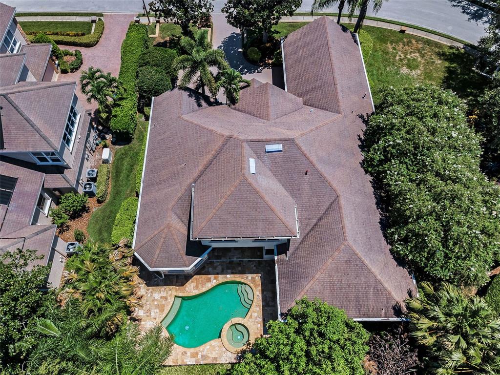 1227 Toscano Drive Trinity, FL 34655 - Photo 4 of 99 an aerial view of a house with a garden