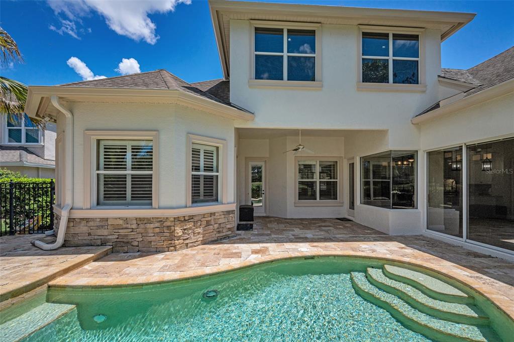 1227 Toscano Drive Trinity, FL 34655 - Photo 66 of 99 a front view of a house with a yard