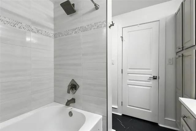 a bathroom with a bathtub