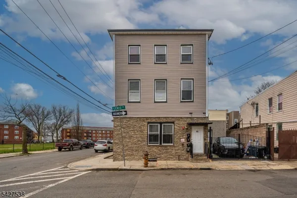 a front view of a building with street