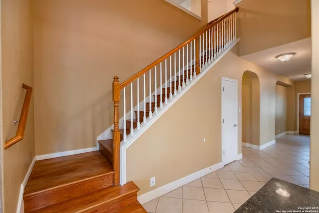 a view of a big room with windows