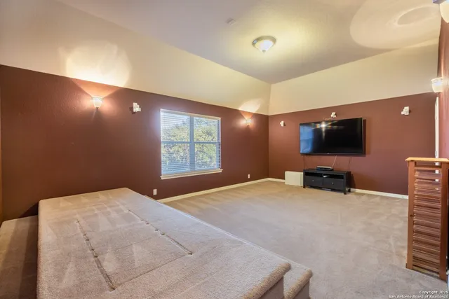 a bath room with a toilet and a bath tub