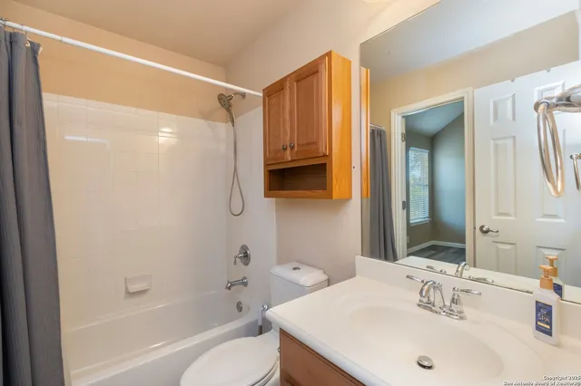 a backyard of a house with outdoor seating