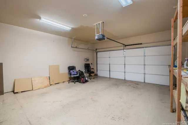 an aerial view of residential house with outdoor space