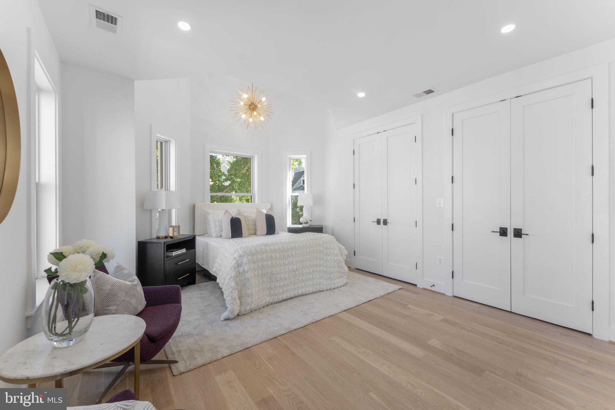 600 U Street Northwest Washington, DC 20001 - Photo 23 of 54 a spacious bedroom with a bed and a couch