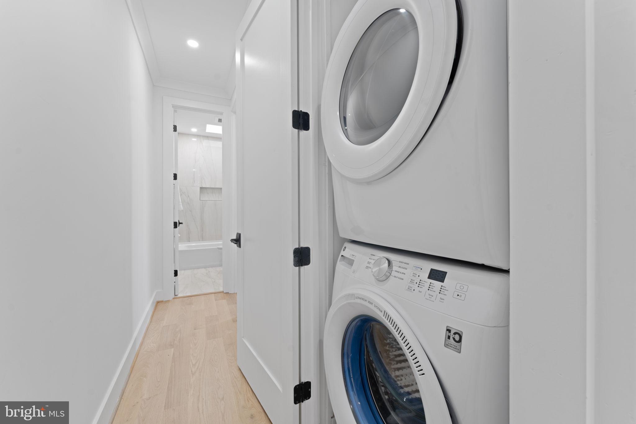 600 U Street Northwest Washington, DC 20001 - Photo 33 of 54 a view of a hallway with washer and dryer