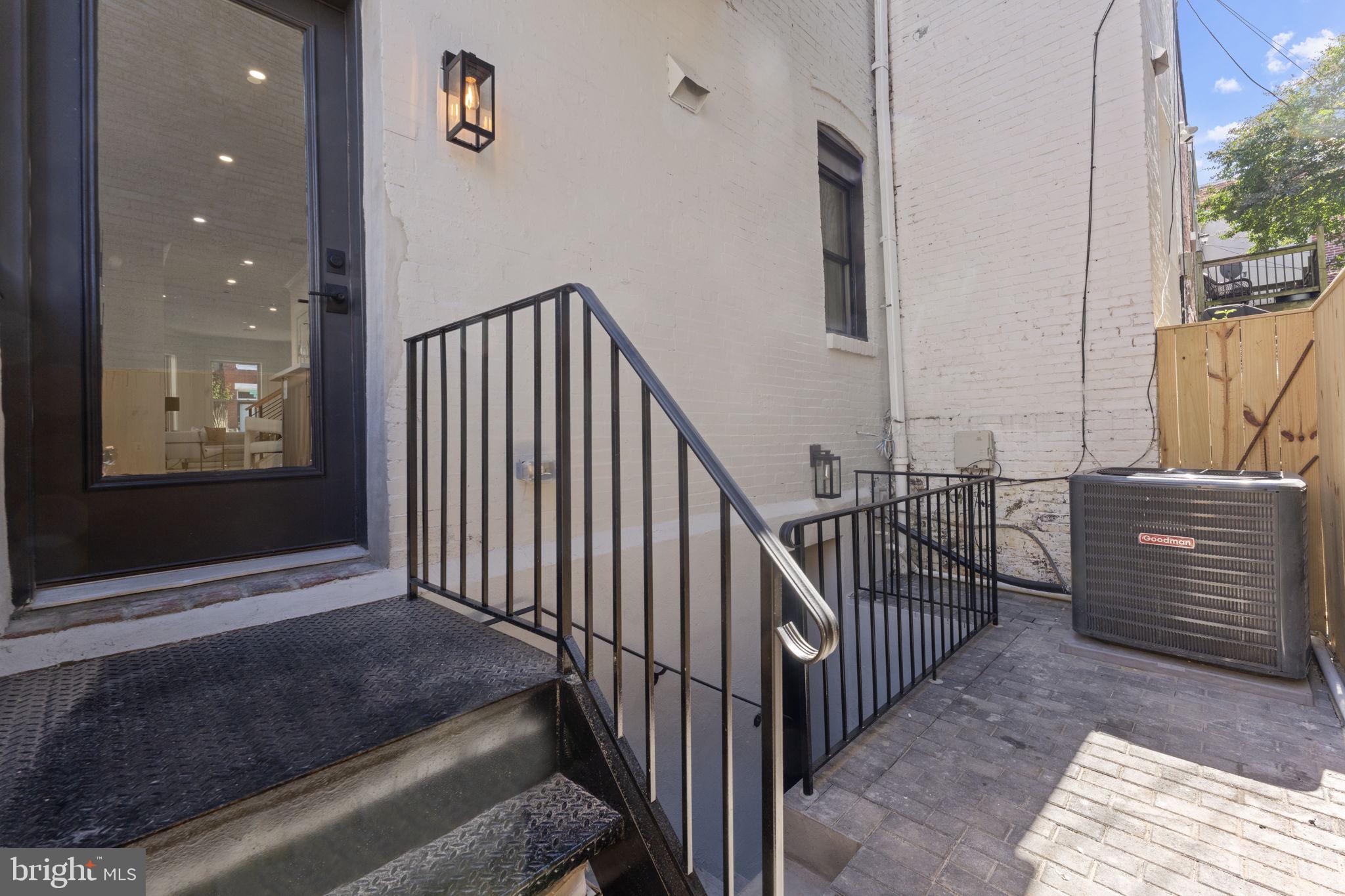 600 U Street Northwest Washington, DC 20001 - Photo 39 of 54 a view of a hallway with wooden floor and windows