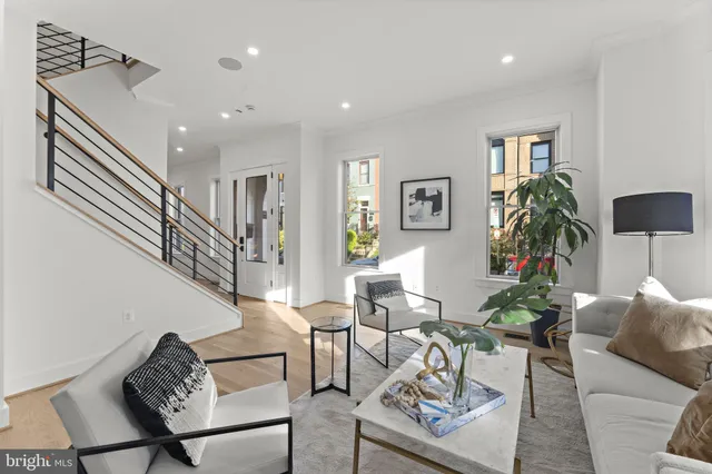 a kitchen with a table and chairs in it