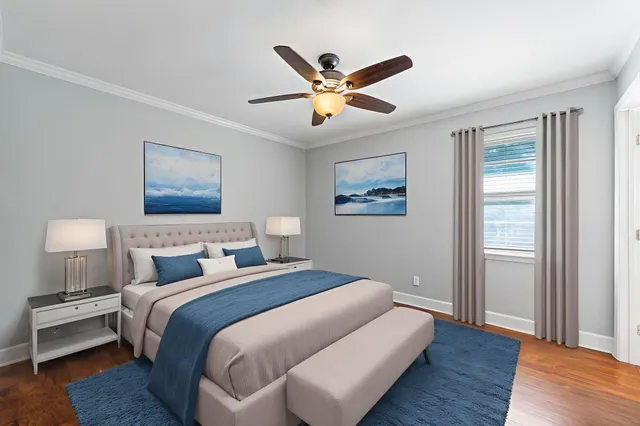 a bedroom with bed and window