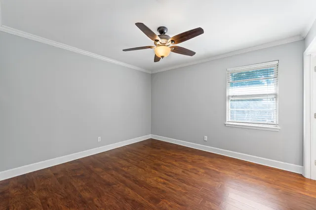 wooden floor in a room with a window