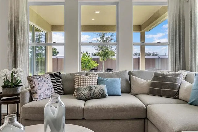 a kitchen with stainless steel appliances granite countertop a stove a microwave and a sink