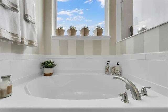 a view of a workspace with furniture and couch