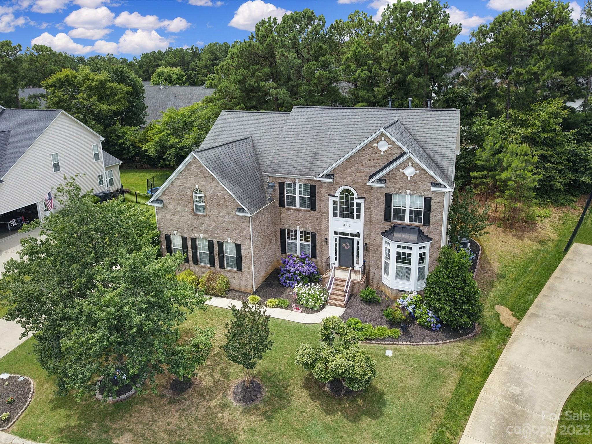 310 Drake Park Avenue Fort Mill, SC 29708 - Photo 2 of 46 a aerial view of a house with a yard