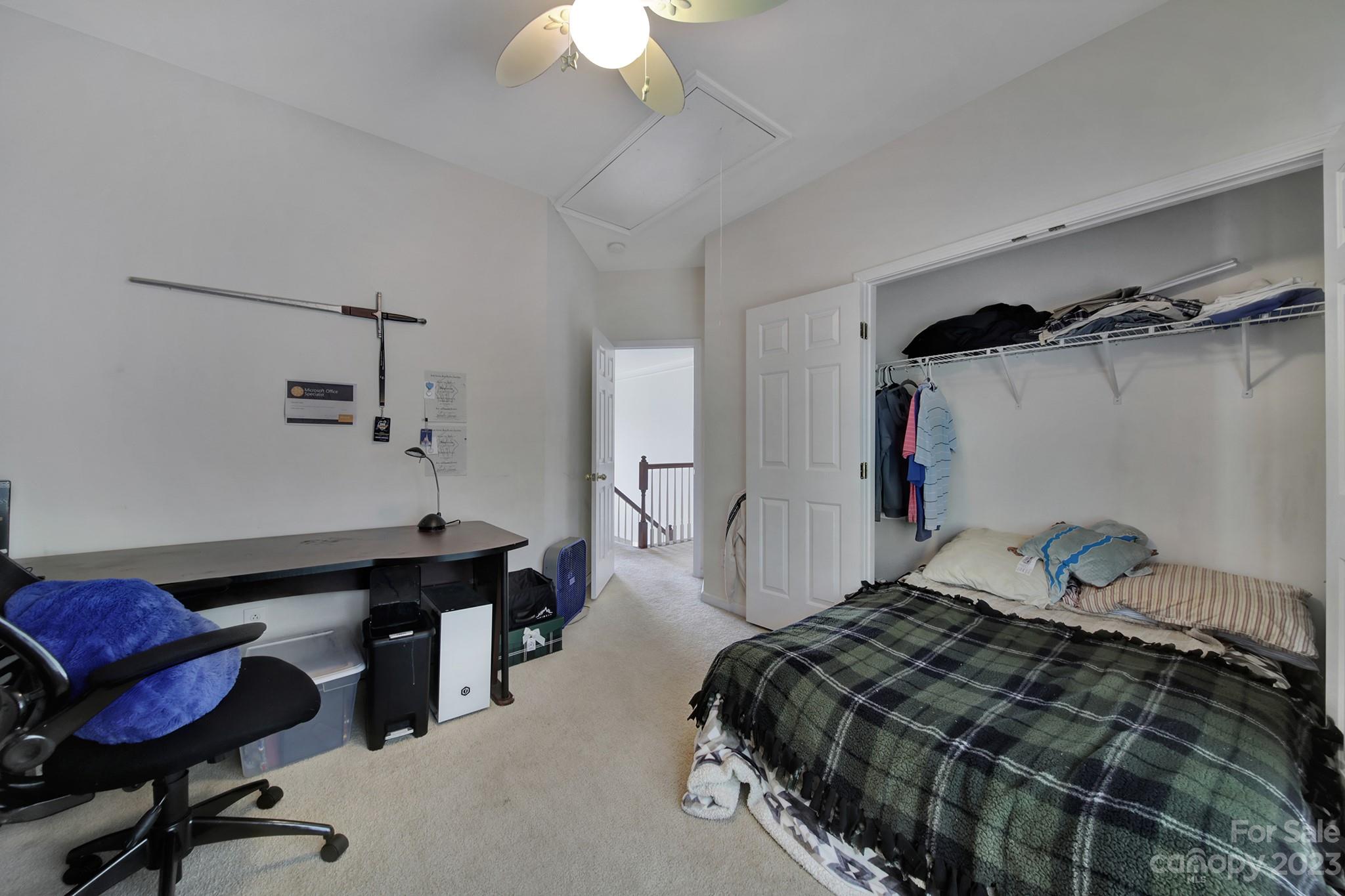 310 Drake Park Avenue Fort Mill, SC 29708 - Photo 33 of 46 a bedroom with a bed a desk and chair