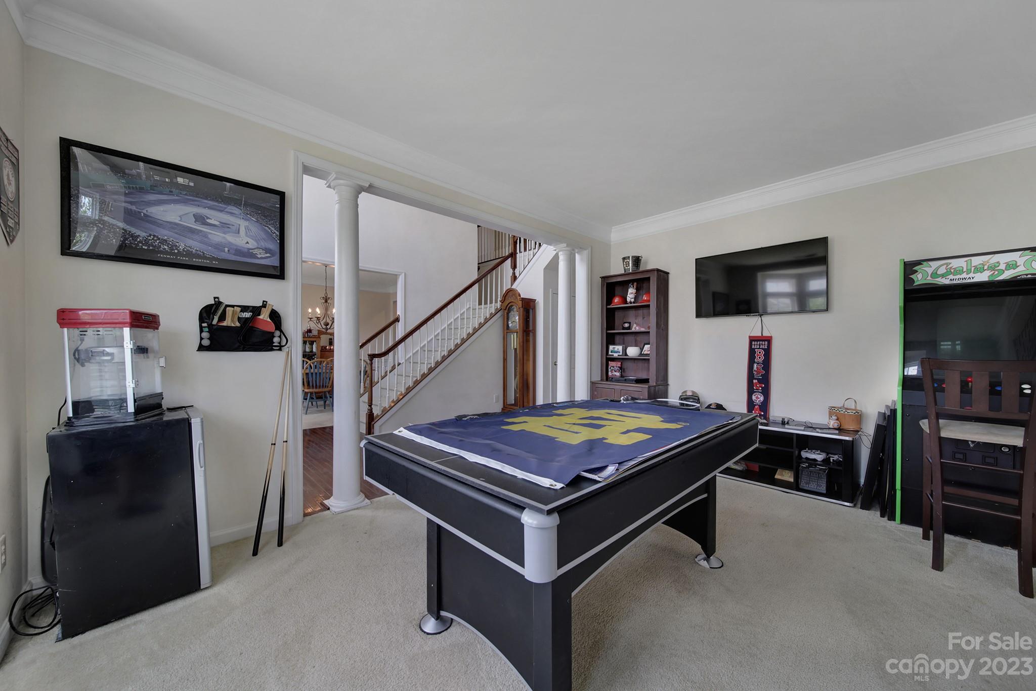 310 Drake Park Avenue Fort Mill, SC 29708 - Photo 8 of 46 a room with furniture and flat screen tv