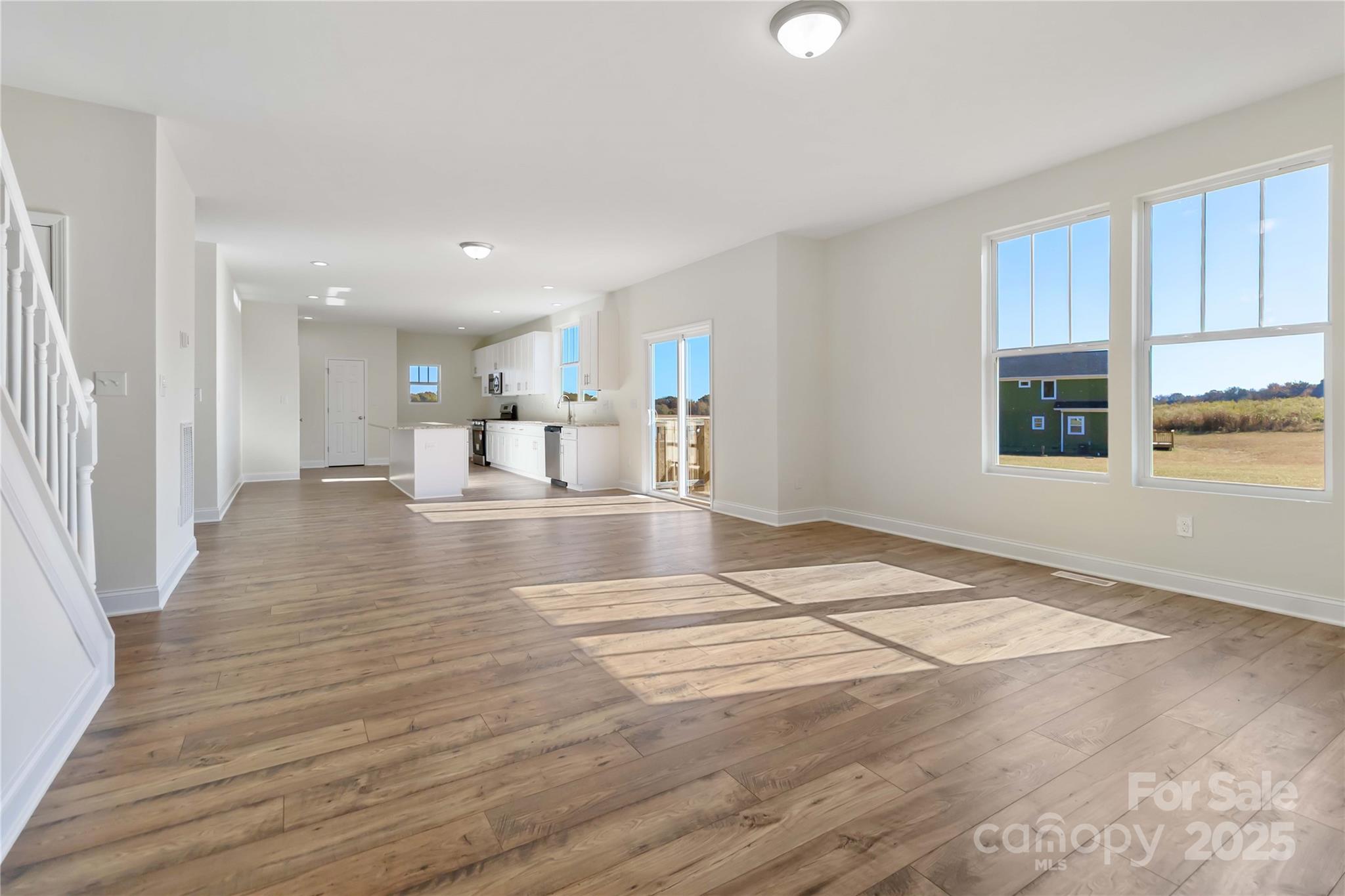1006 Heath Helms Road Monroe, NC 28110 - Photo 14 of 48 a view of a kitchen with a sink and cabinets