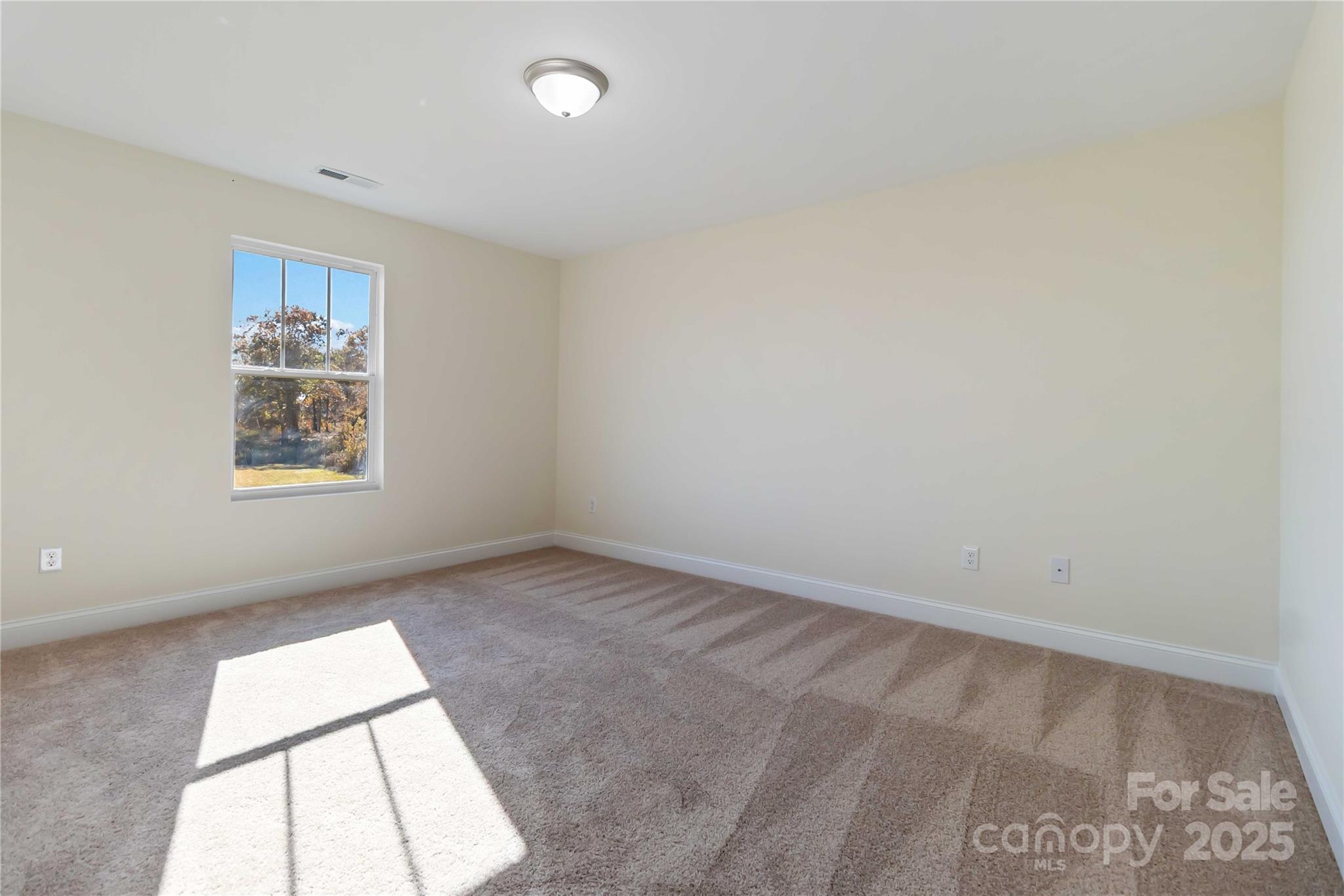 1006 Heath Helms Road Monroe, NC 28110 - Photo 19 of 48 an empty room with a window