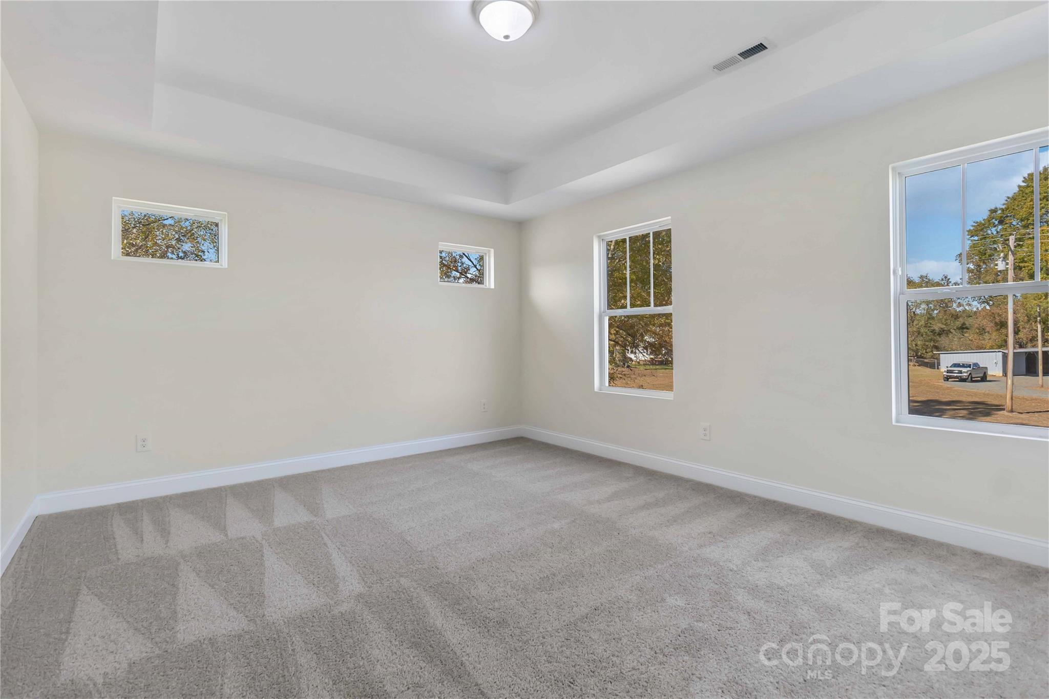 1006 Heath Helms Road Monroe, NC 28110 - Photo 28 of 48 a view of an empty room with a window