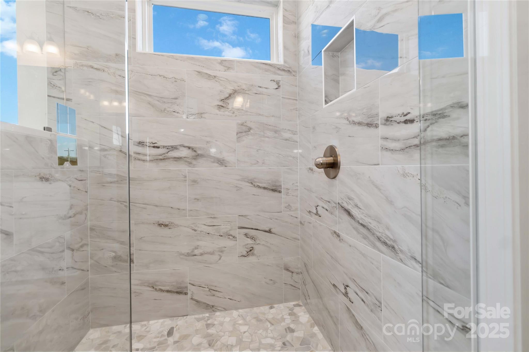 1006 Heath Helms Road Monroe, NC 28110 - Photo 36 of 48 a bathroom with a shower