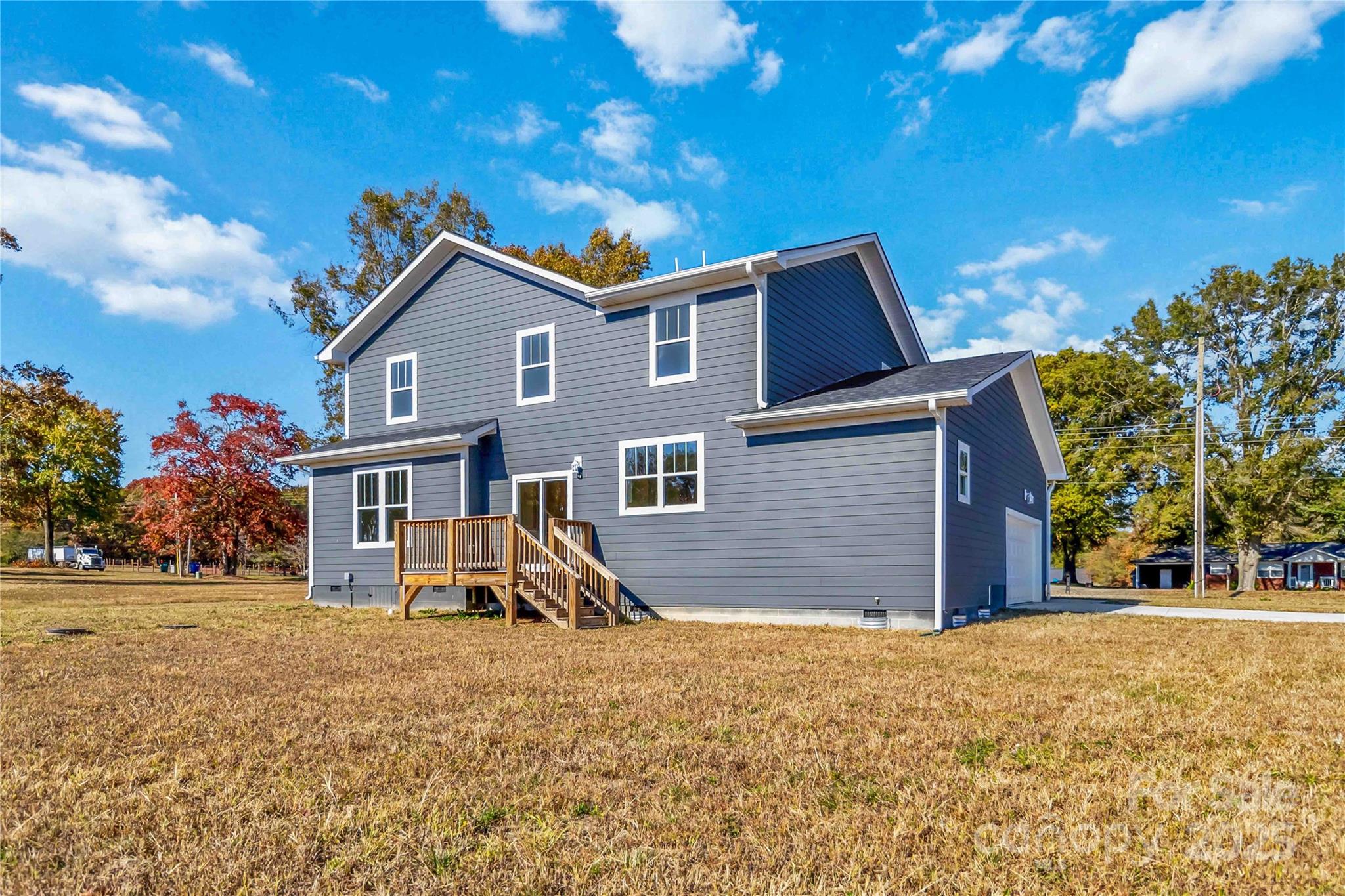 1006 Heath Helms Road Monroe, NC 28110 - Photo 37 of 48 a front view of a house with a yard