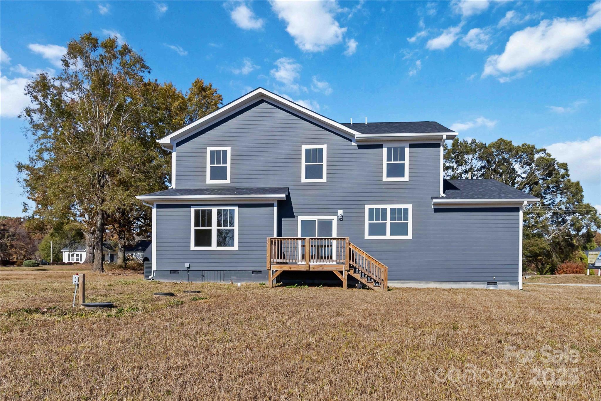 1006 Heath Helms Road Monroe, NC 28110 - Photo 38 of 48 a front view of a house with a yard