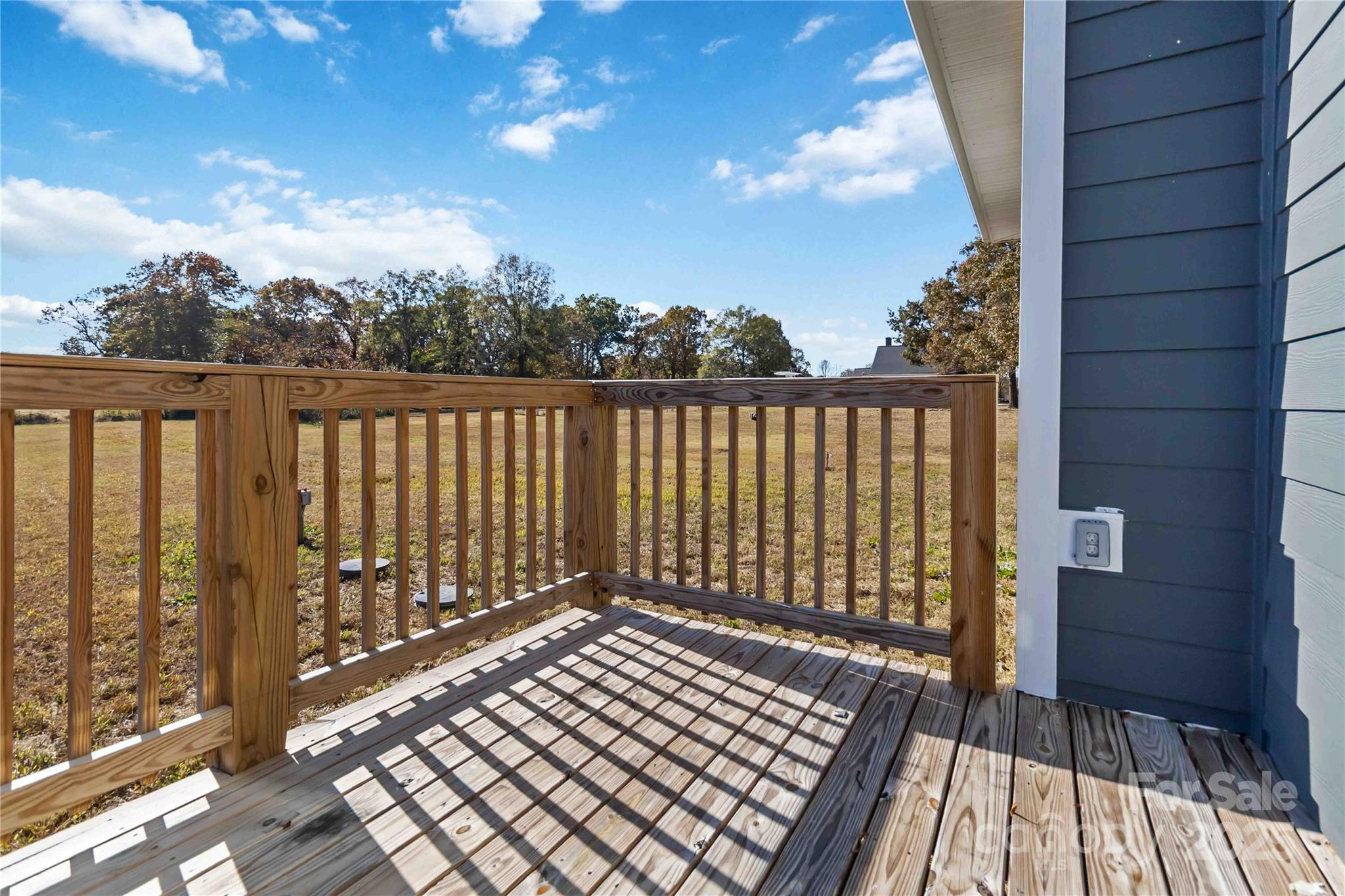 1006 Heath Helms Road Monroe, NC 28110 - Photo 39 of 48 a view of balcony with wooden floor