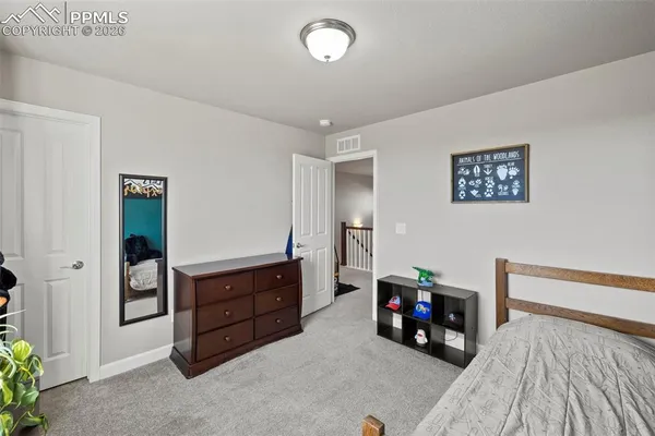 a view of livingroom with furniture and toys