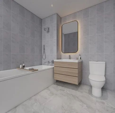 a spacious bedroom with a bed and a chandelier