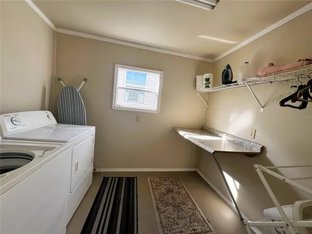 a storage room with washer and dryer