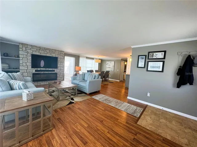 a living room with furniture or couch and a flat screen tv