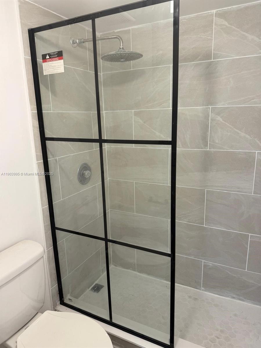 10253 Northwest 9th St Circle, Unit 4066 Miami, FL 33172 - Photo 27 of 27 a bathroom with a shower