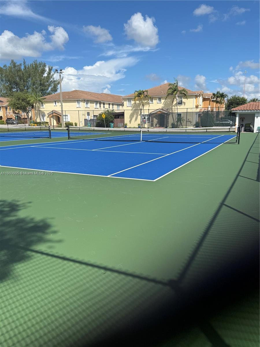 10253 Northwest 9th St Circle, Unit 4066 Miami, FL 33172 - Photo 6 of 27 a view of an outdoor space and tv