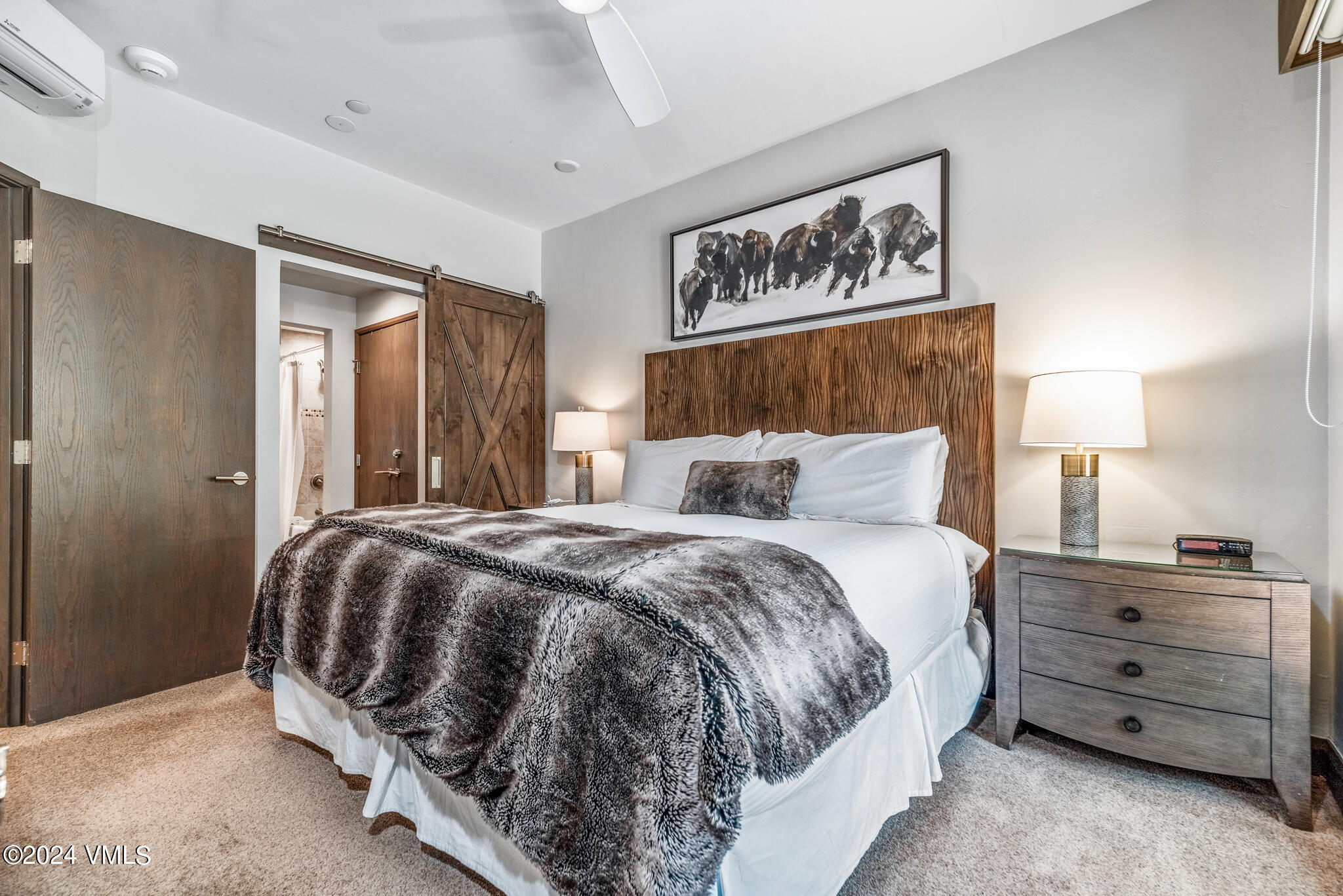 120 Offerson Road, Unit F230 Beaver Creek, CO 81620 - Photo 16 of 48 a bedroom with a bed and a night stand