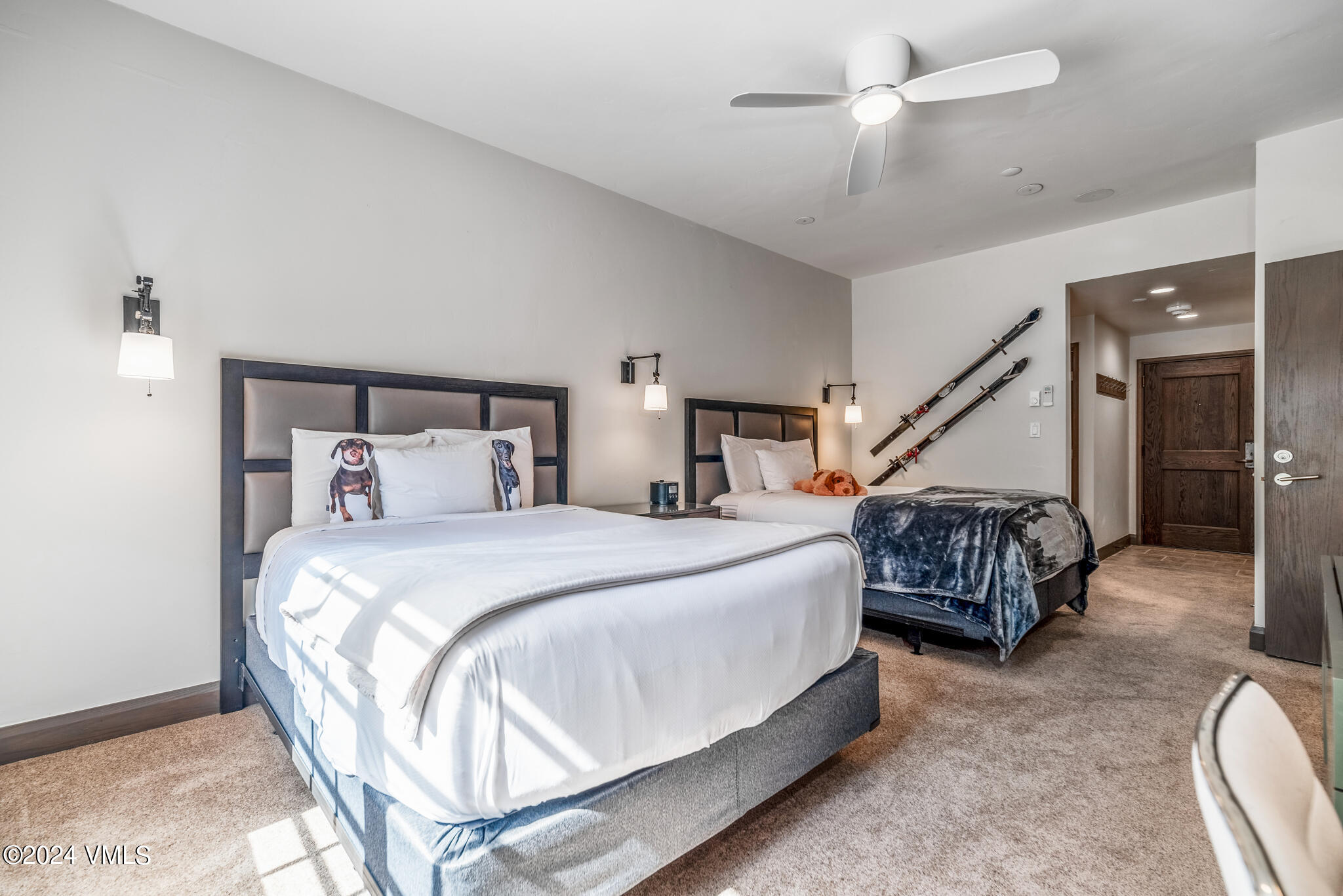 120 Offerson Road, Unit F230 Beaver Creek, CO 81620 - Photo 22 of 48 a bed room with a bed and a chandelier