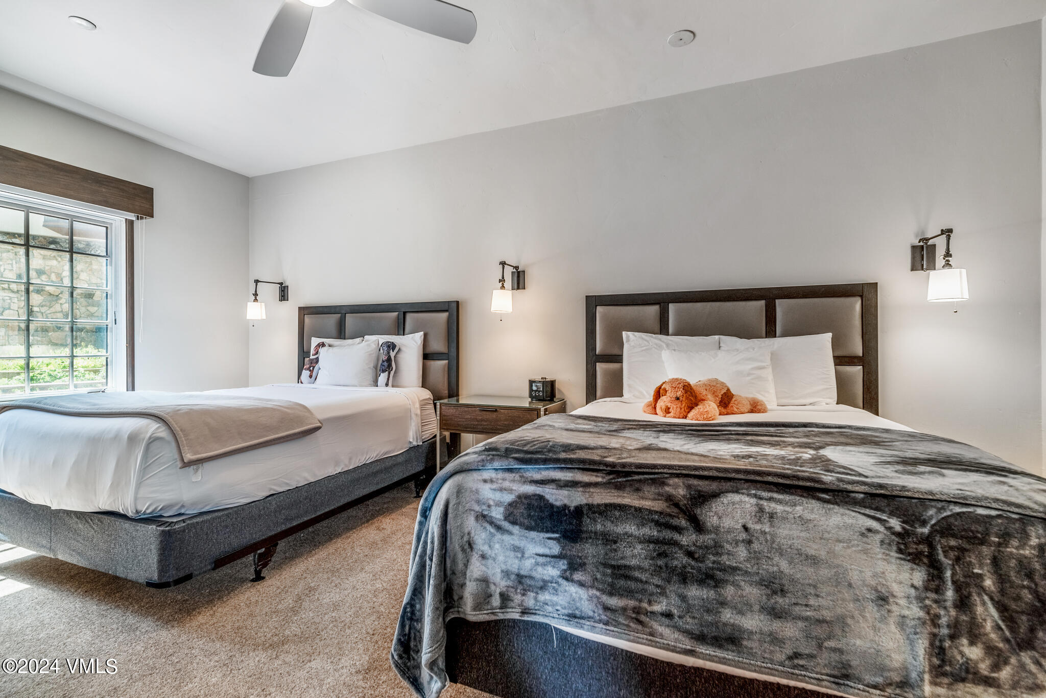 120 Offerson Road, Unit F230 Beaver Creek, CO 81620 - Photo 23 of 48 a bedroom with two beds and window